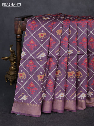 Munga tussar silk saree purple with allover patola prints and zari woven border
