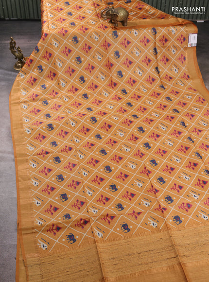 Munga tussar silk saree mustard yellow with allover patola prints and zari woven border