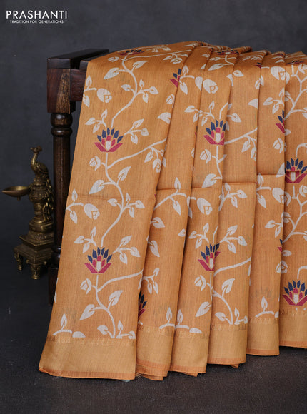 Munga tussar silk saree mustard yellow with allover prints and zari woven border