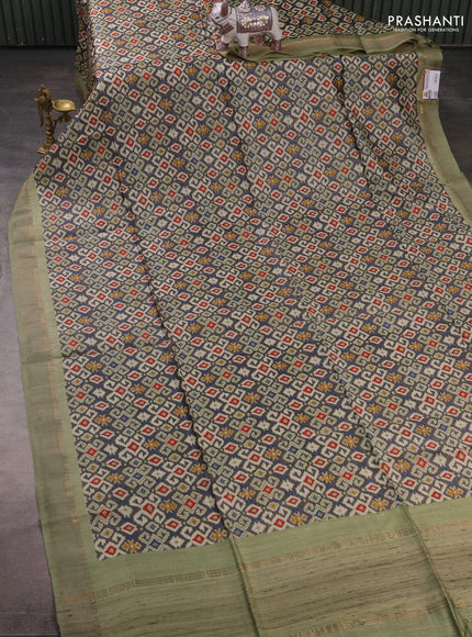 Munga tussar silk saree pastel green and grey with allover ajrakh prints and zari woven border