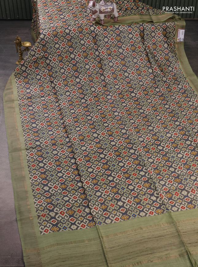 Munga tussar silk saree pastel green and grey with allover ajrakh prints and zari woven border