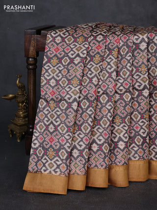 Munga tussar silk saree mustard yellow and grey with allover ajrakh prints and zari woven border
