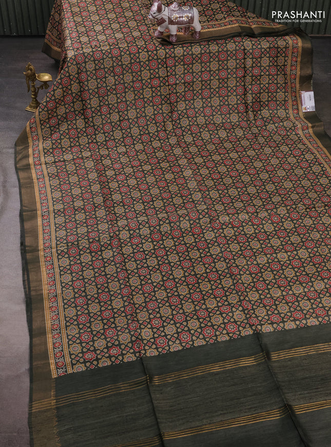 Munga tussar silk saree deep sap green with allover ajrakh prints and zari woven border