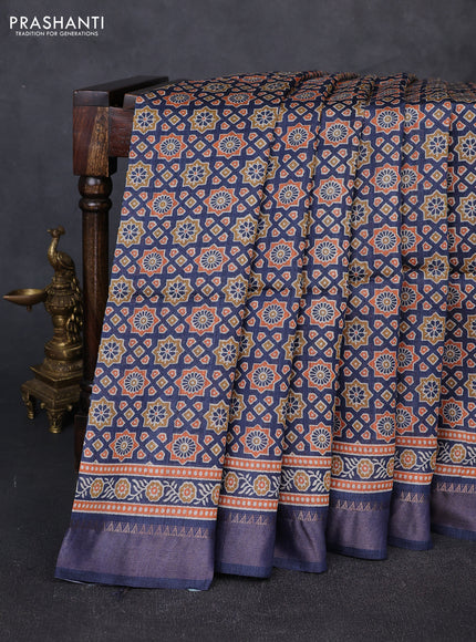 Munga tussar silk saree blue with allover ajrakh prints and zari woven border