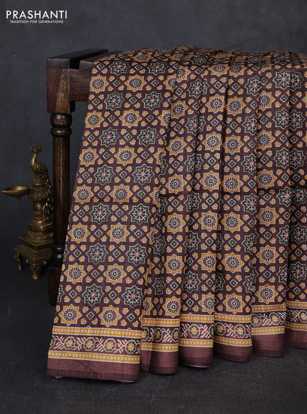 Munga tussar silk saree coffee brown with allover ajrakh prints and zari woven border