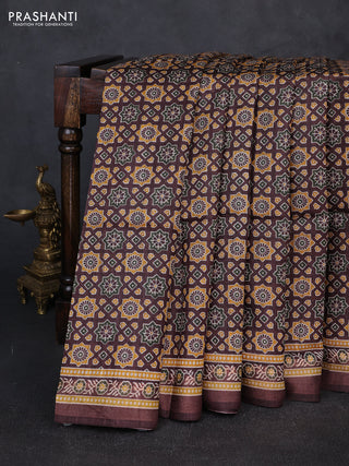 Munga tussar silk saree coffee brown with allover ajrakh prints and zari woven border