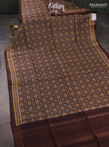Munga tussar silk saree coffee brown with allover ajrakh prints and zari woven border