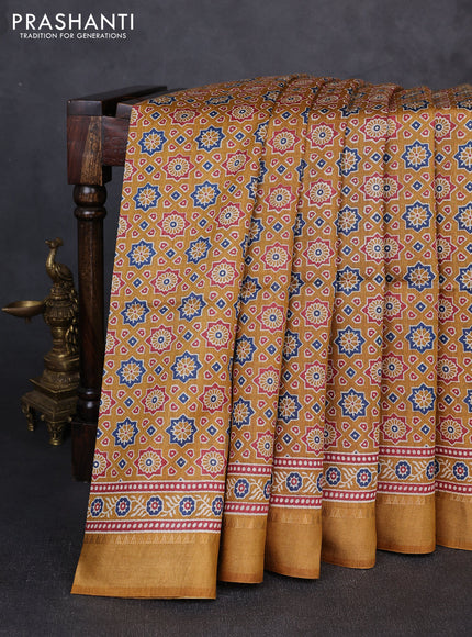 Munga tussar silk saree mustard yellow with allover ajrakh prints and zari woven border