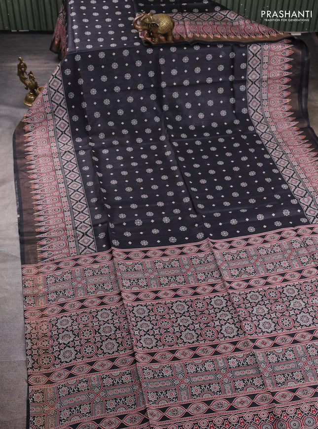 Munga tussar silk saree black with allover butta prints and ajrakh printed pallu