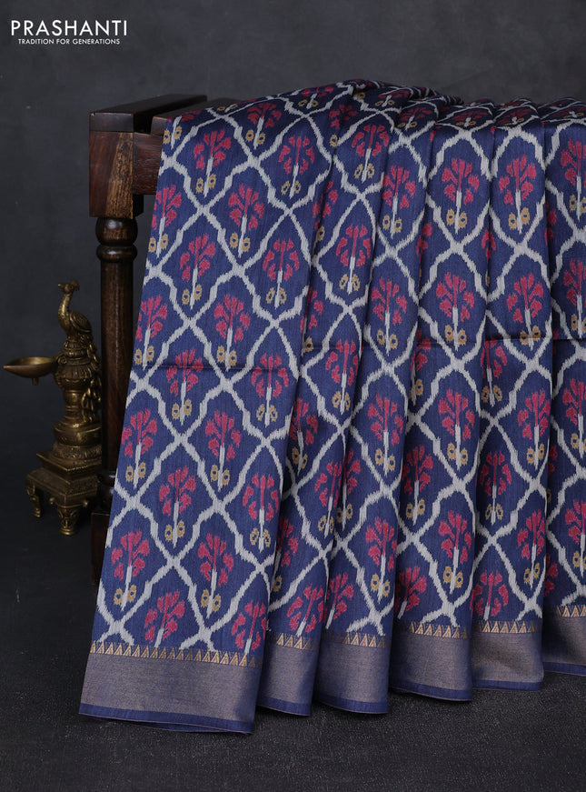Munga tussar silk saree navy blue with allover ikat prints and zari woven border
