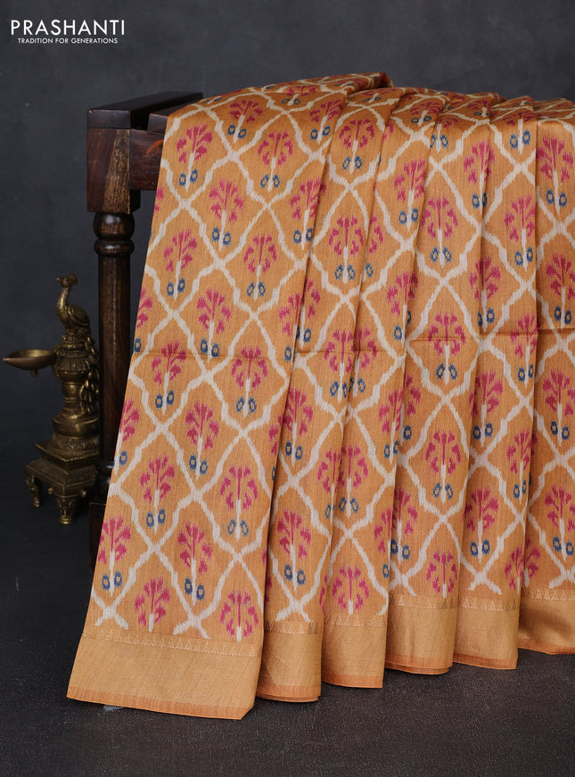 Munga tussar silk saree mustard yellow with allover ikat prints and zari woven border