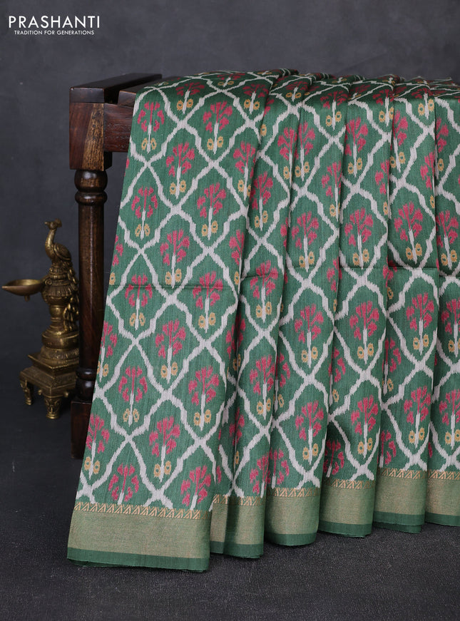 Munga tussar silk saree green with allover ikat prints and zari woven border