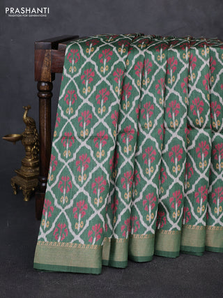 Munga tussar silk saree green with allover ikat prints and zari woven border