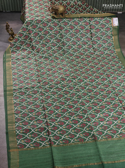 Munga tussar silk saree green with allover ikat prints and zari woven border