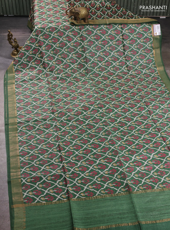 Munga tussar silk saree green with allover ikat prints and zari woven border
