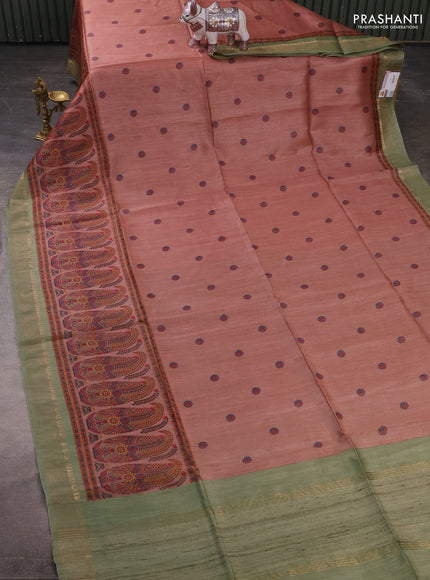 Munga tussar silk saree pastel green and dark peach with allover butta prints and zari woven border