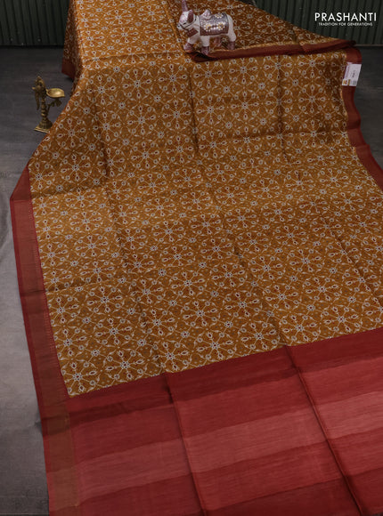 Munga tussar silk saree maroon and dark mustard with allover ikat prints and zari woven border
