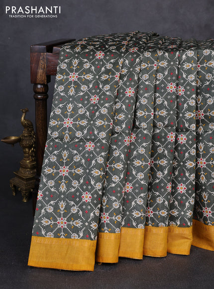 Munga tussar silk saree mustard yellow and deep sap green with allover ikat prints and zari woven border