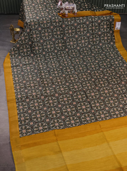 Munga tussar silk saree mustard yellow and deep sap green with allover ikat prints and zari woven border