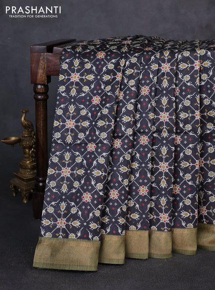 Munga tussar silk saree olive green and black with allover ikat prints and zari woven border