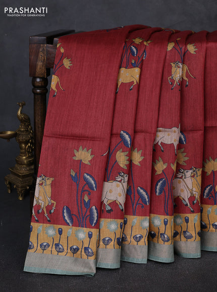 Munga tussar silk saree maroon and pastel green with allover pichwai prints and zari woven border