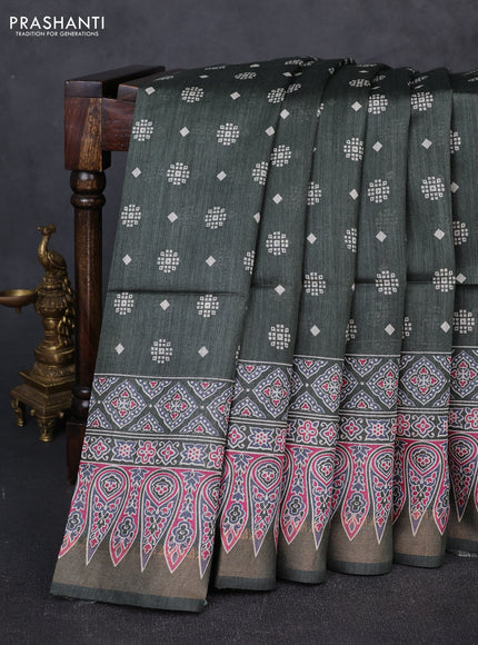 Munga tussar silk saree deep sap green with allover gematric prints and ajrakh printed pallu