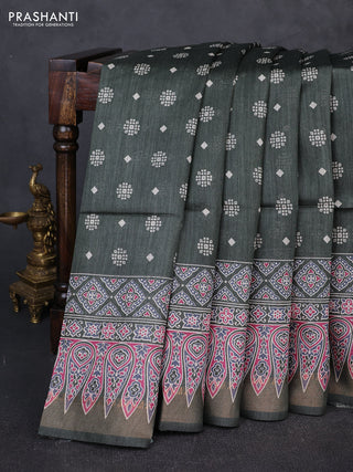 Munga tussar silk saree deep sap green with allover gematric prints and ajrakh printed pallu