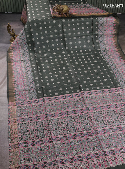 Munga tussar silk saree deep sap green with allover gematric prints and ajrakh printed pallu