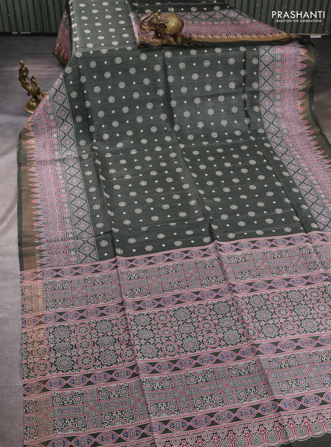 Munga tussar silk saree deep sap green with allover gematric prints and ajrakh printed pallu
