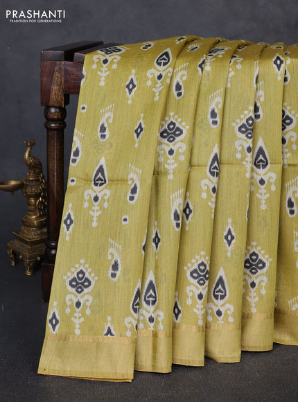 Munga tussar silk saree mustard green with allover ikat prints and zari woven border
