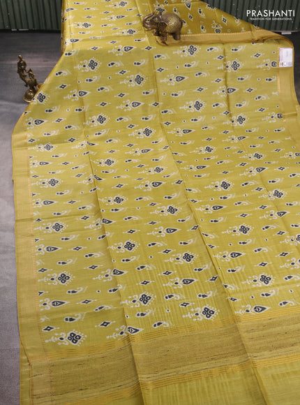 Munga tussar silk saree mustard green with allover ikat prints and zari woven border