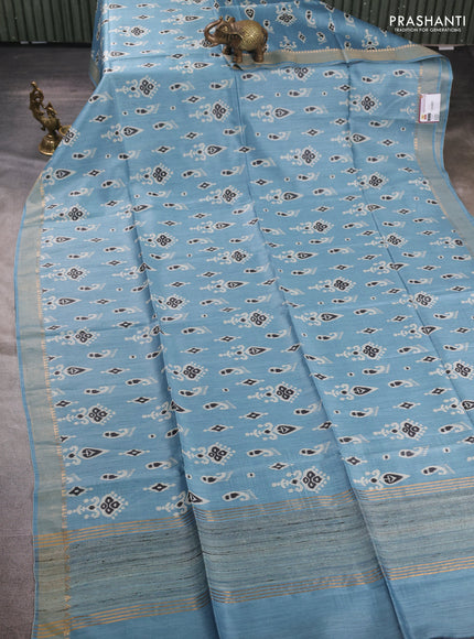 Munga tussar silk saree pastel blue with allover ikat prints and zari woven border