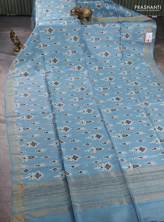 Munga tussar silk saree pastel blue with allover ikat prints and zari woven border