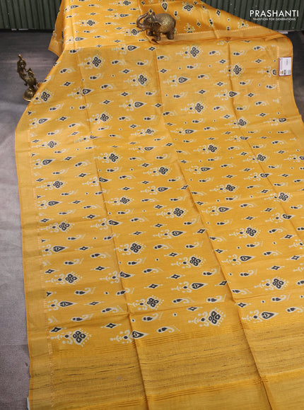 Munga tussar silk saree mustard yellow with allover ikat prints and zari woven border