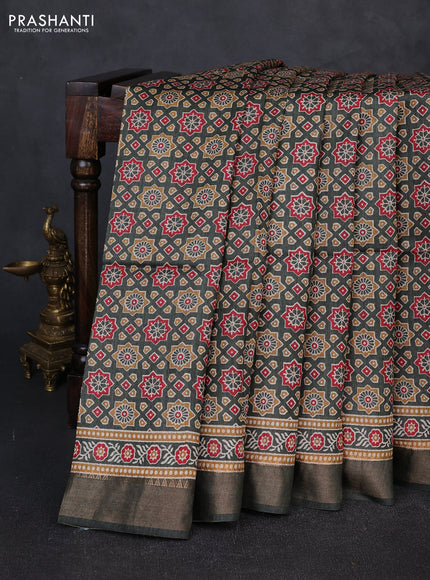 Munga tussar silk saree green with allover ajrakh prints and zari woven border