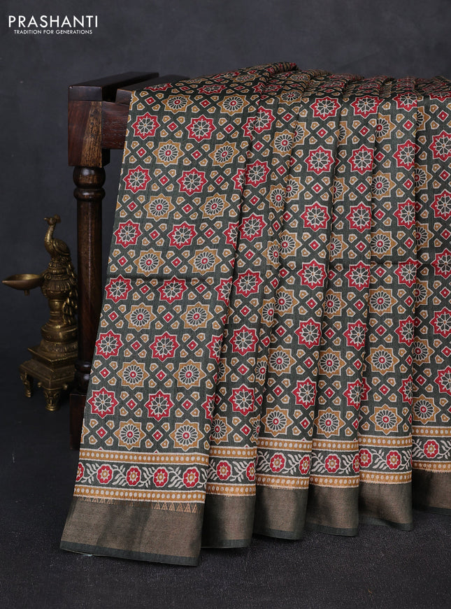 Munga tussar silk saree green with allover ajrakh prints and zari woven border