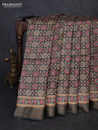 Munga tussar silk saree green with allover ajrakh prints and zari woven border