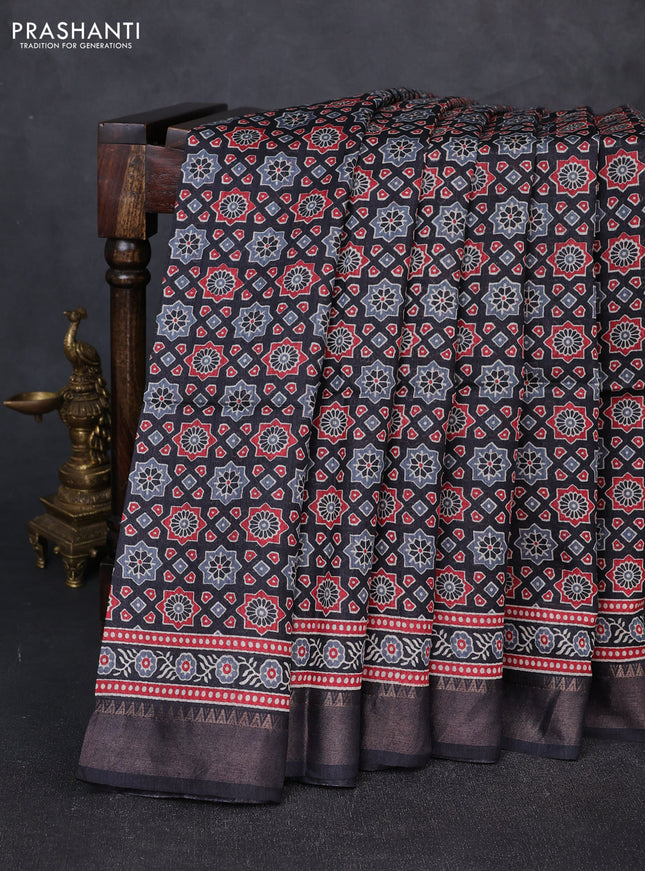 Munga tussar silk saree black with allover ajrakh prints and zari woven border