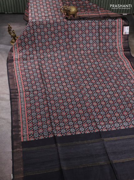 Munga tussar silk saree black with allover ajrakh prints and zari woven border