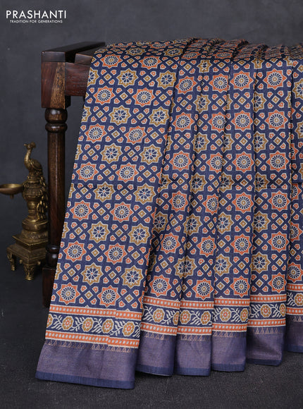 Munga tussar silk saree blue with allover ajrakh prints and zari woven border