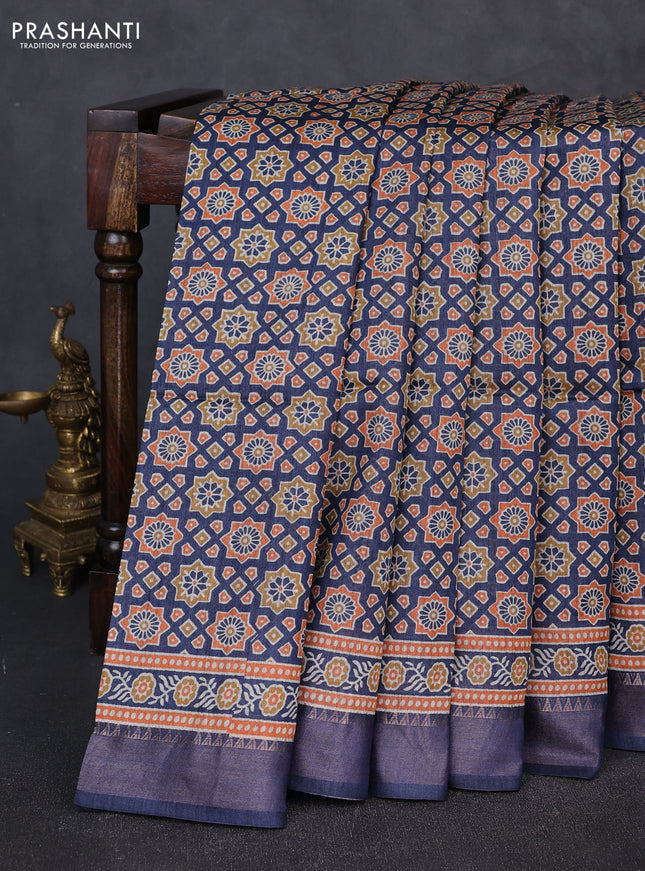 Munga tussar silk saree blue with allover ajrakh prints and zari woven border