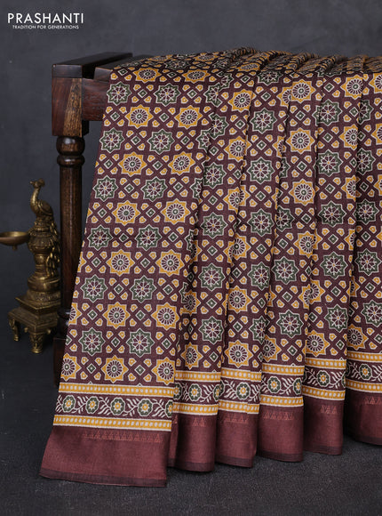 Munga tussar silk saree coffee brown with allover ajrakh prints and zari woven border