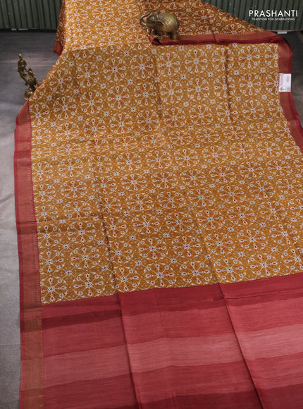 Munga tussar silk saree dark mustard and maroon with allover ikat prints and zari woven border