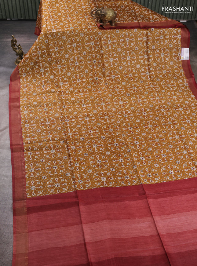 Munga tussar silk saree dark mustard and maroon with allover ikat prints and zari woven border