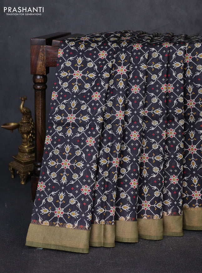 Munga tussar silk saree black and mehendi green with allover ikat prints and zari woven border