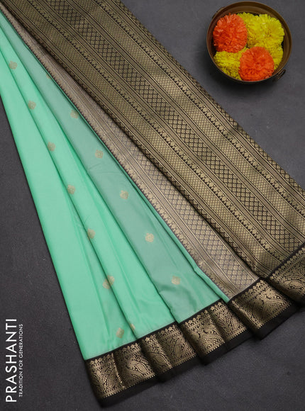 Semi kanchipuram silk saree teal green and coffee brown with zari woven buttas and small zari woven border