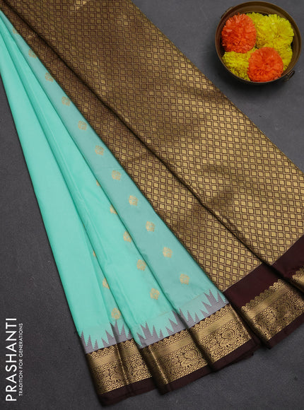 Semi kanchipuram silk saree teal green and coffee brown with allover zari woven buttas and temple design zari woven border