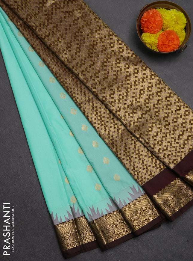 Semi kanchipuram silk saree teal green and coffee brown with allover zari woven buttas and temple design zari woven border