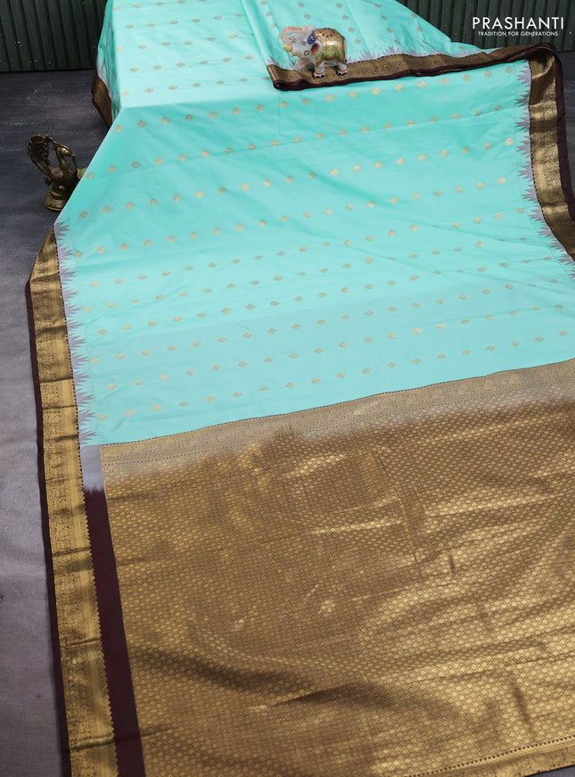 Semi kanchipuram silk saree teal green and coffee brown with allover zari woven buttas and temple design zari woven border