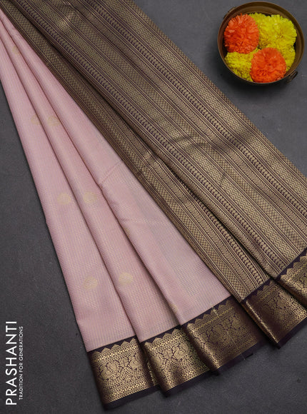 Semi kanchipuram silk saree pastel pink and deep purple with allover small zari checks & buttas and temple design zari woven border
